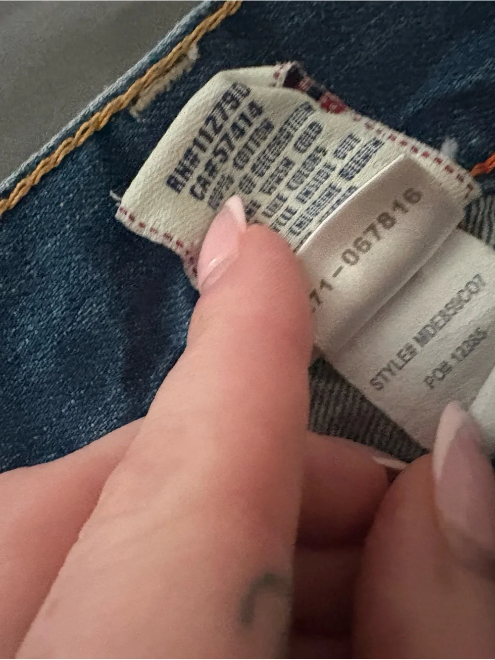 True Religion Men's Straight Jeans in Medium Blue with Distressed Hem